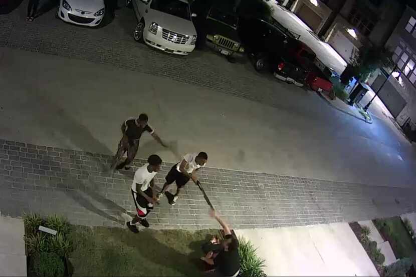 Surveillance video shows three young teens confronting a couple at gunpoint early July 22 in...