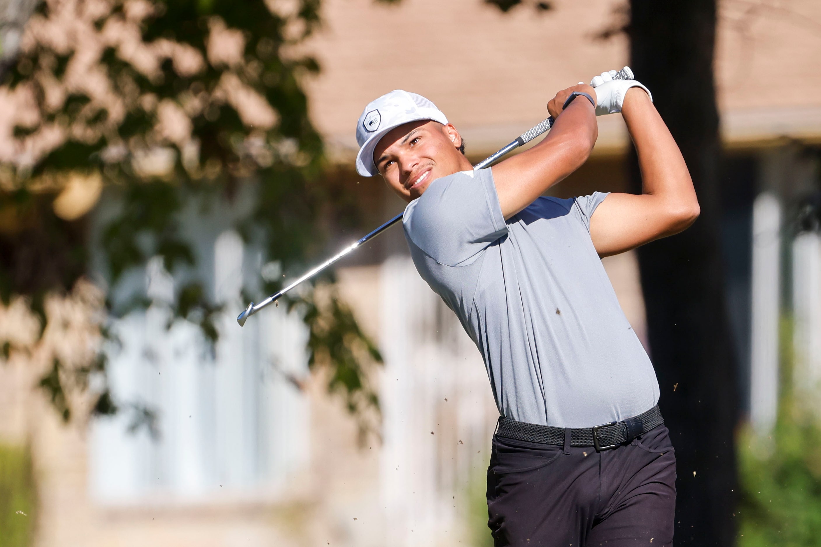 Xavier Bighaus of Colorado Christian University who grew up in Melissa, tees off on the...