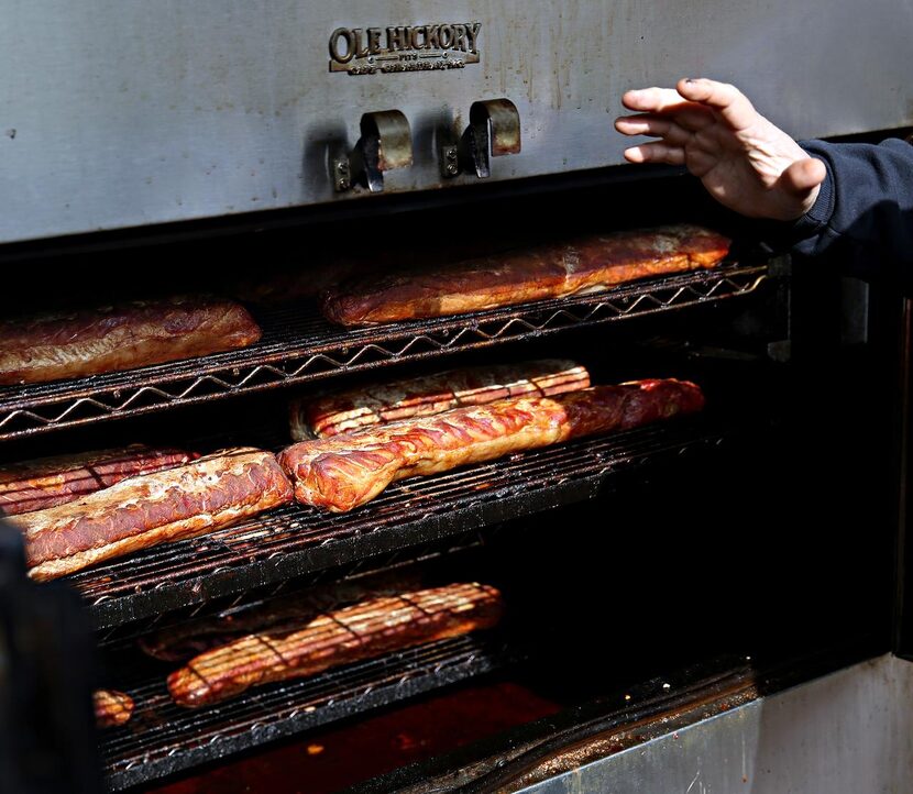 
Bryan McLarty, Texas coordinator for Operation BBQ Relief, cooks pork loin.
