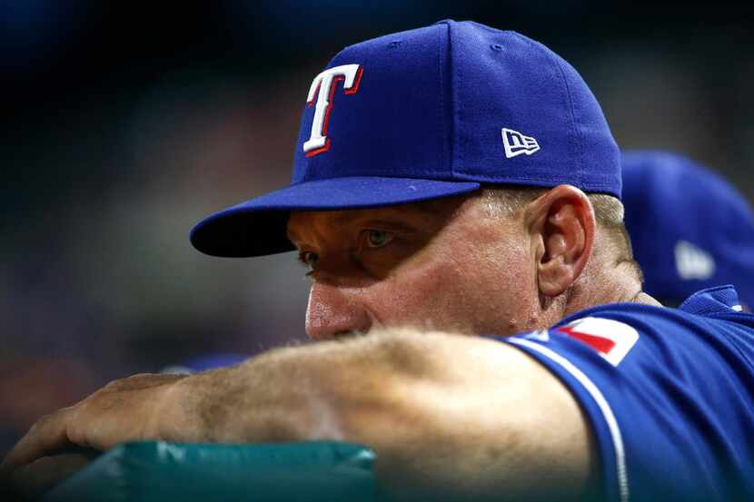 Texas Rangers manager Jeff Banister watches during the fifth inning of the team's baseball...