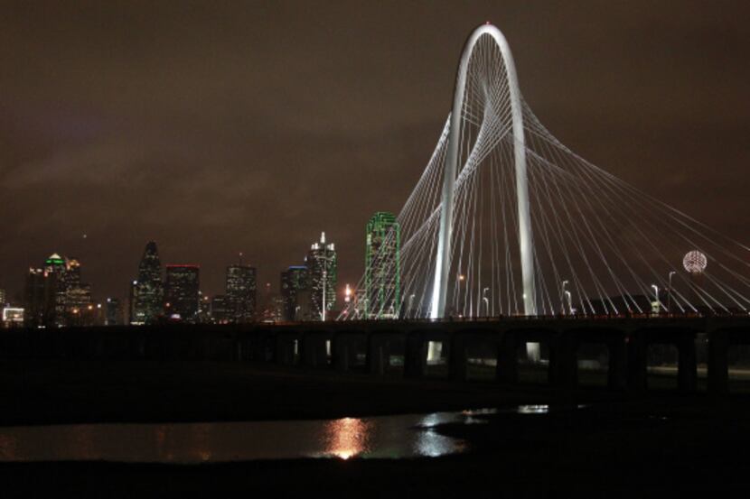 The new Calatrava bridge, named the Margaret Hunt Hill Bridge, after lighting ceremonies, in...