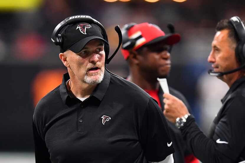 Falcons head coach Dan Quinn is pictured on the sideline during the second quarter of a game...