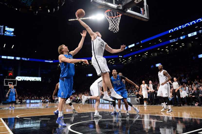 Jan 24, 2014; Brooklyn, NY, USA; Brooklyn Nets power forward Mirza Teletovic (33) pulls down...