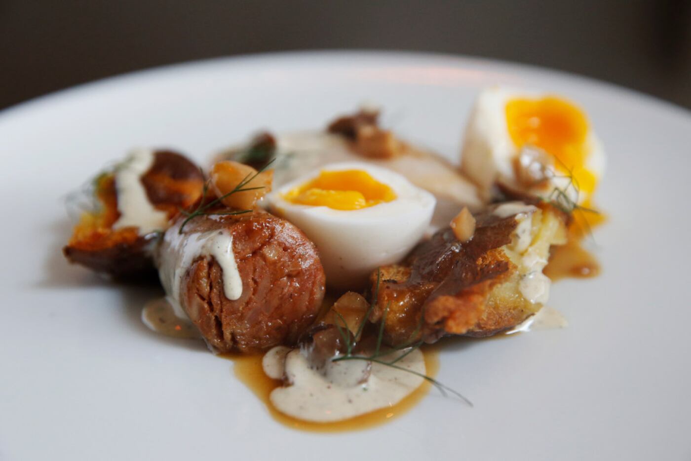 "Al of the chicken . . . and the egg" features roasted-then-butter-basted breast, confit...