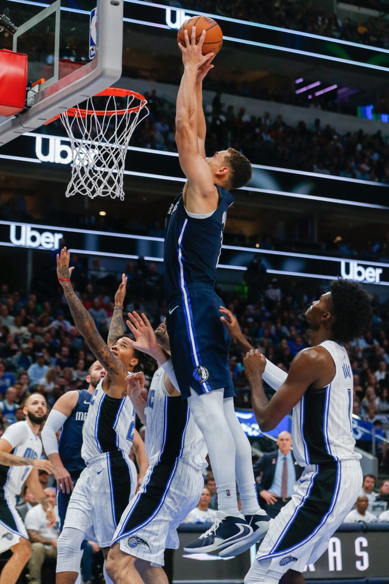 Dallas Mavericks forward Dwight Powell (7) dunks a shot during the second quarter of an NBA...