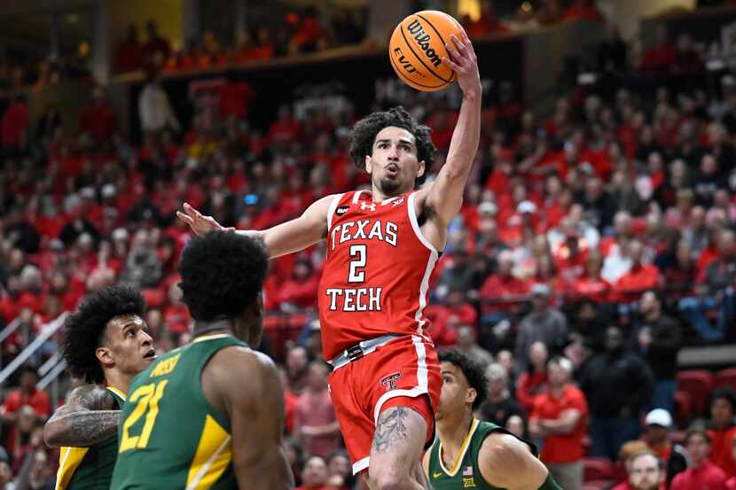 Texas Tech guard Pop Isaacs (2) attempts a layup against Baylor during the first half of an...