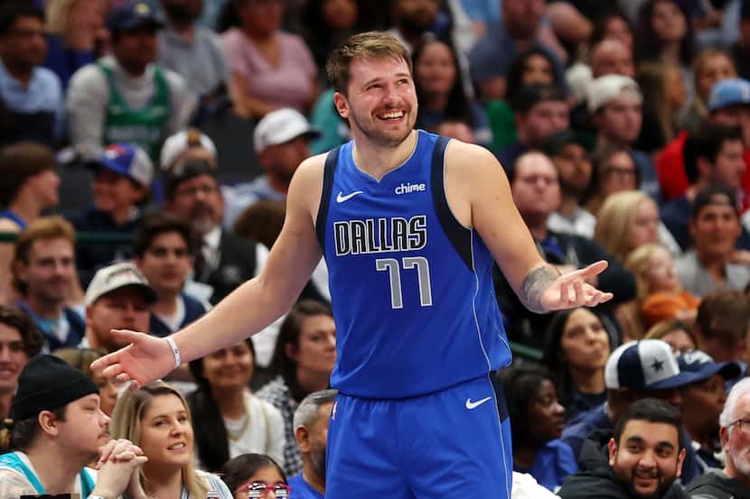 Dallas Mavericks guard Luka Doncic (77) reacts after a foul call in the second half in an...