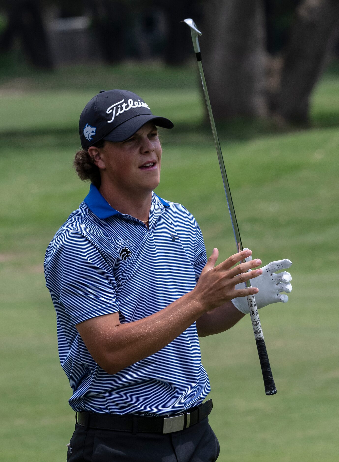 Plano West Matt Comegys, reacts to his fairway shot on the 18th hole during the final round...