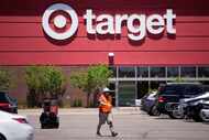 Target says it's cutting prices on about 5,000 food, beverage and household essential items,...