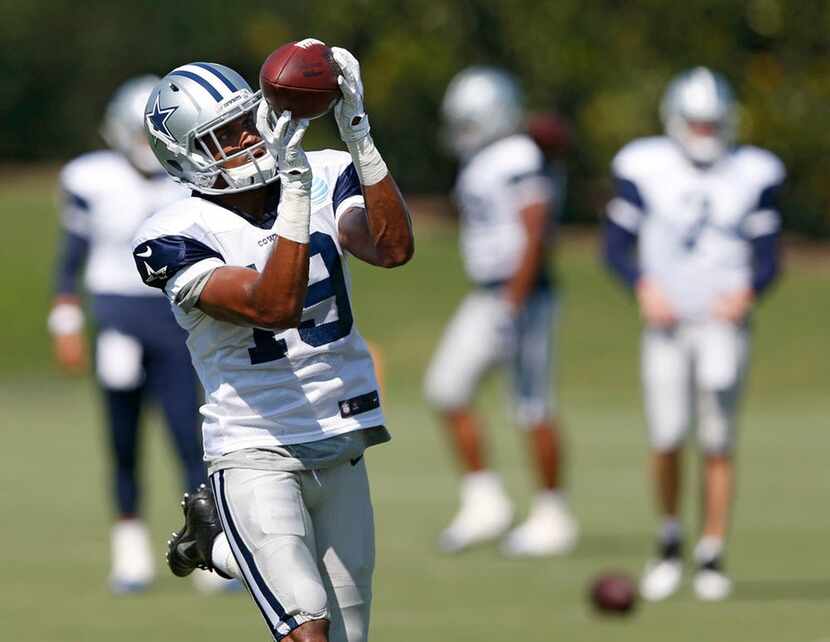 Dallas Cowboys wide receiver Brice Butler (19) catches a pass in a drill during practice at...