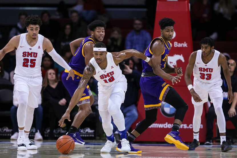Southern Methodist's Jarrey Foster (10) drives down the court against East Carolina on...