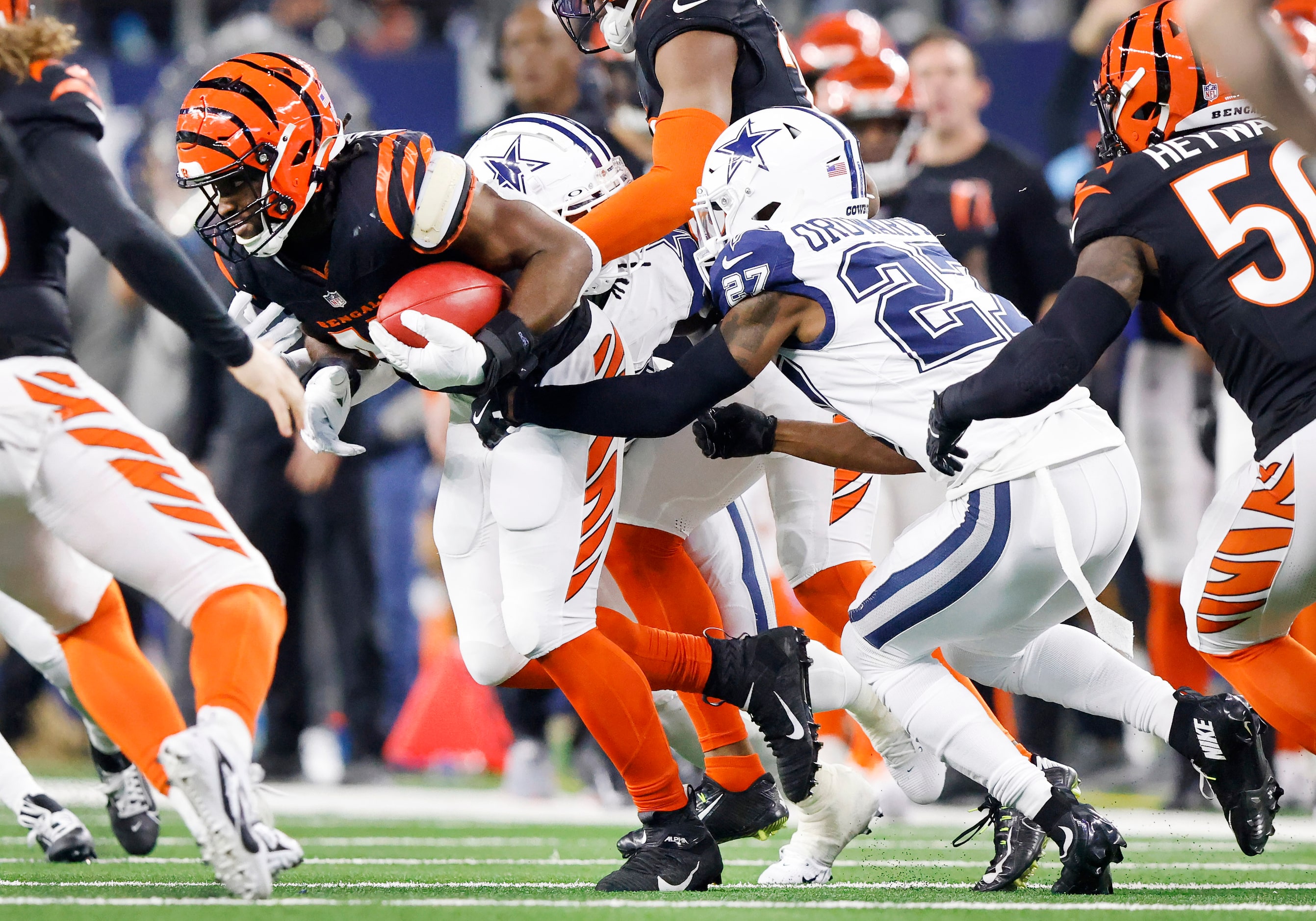 Cincinnati Bengals linebacker Maema Njongmeta (45) recovers a muffed punt by Dallas Cowboys...