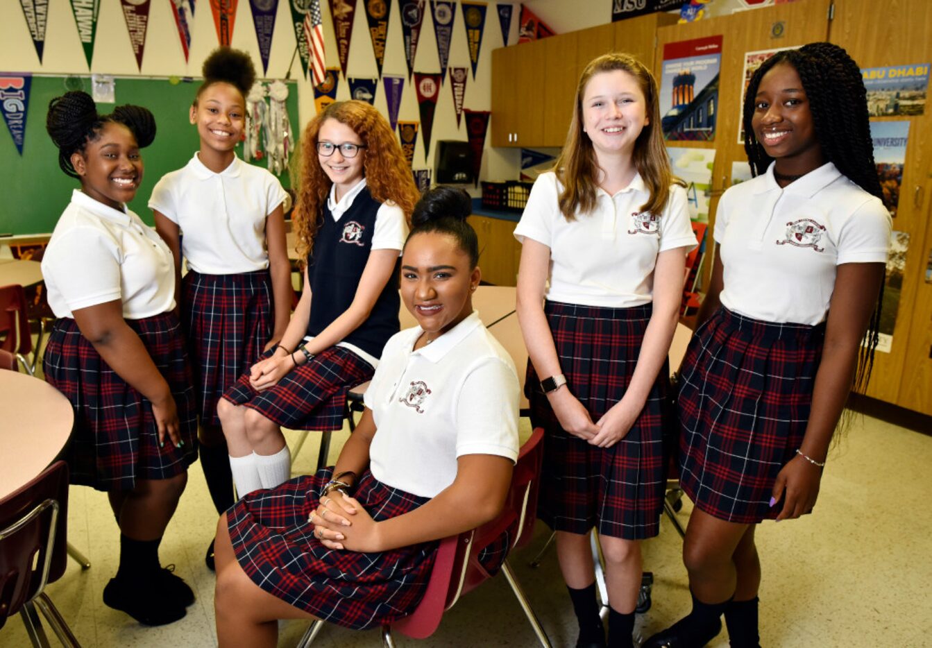 From left: Middle school students Hannah Wesley, Etana King, Marisol Braun, Angelina...