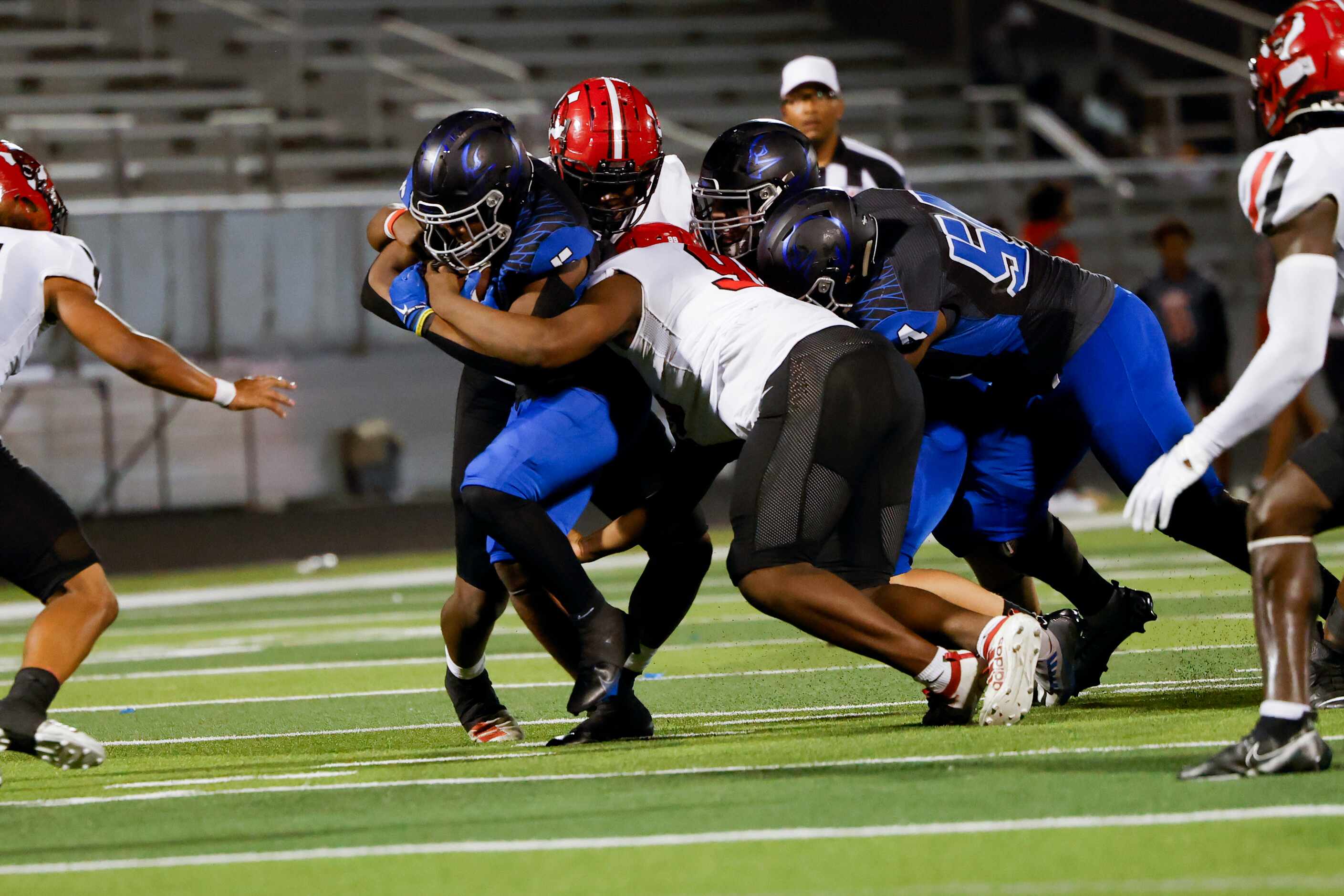 North Forney’s Damorrea Jones (5) is tacked by the Mesquite Horn’s defense during the second...