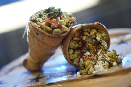 Elotes inside an edible bread cone? They're creamy and spicy. This new item is available at...