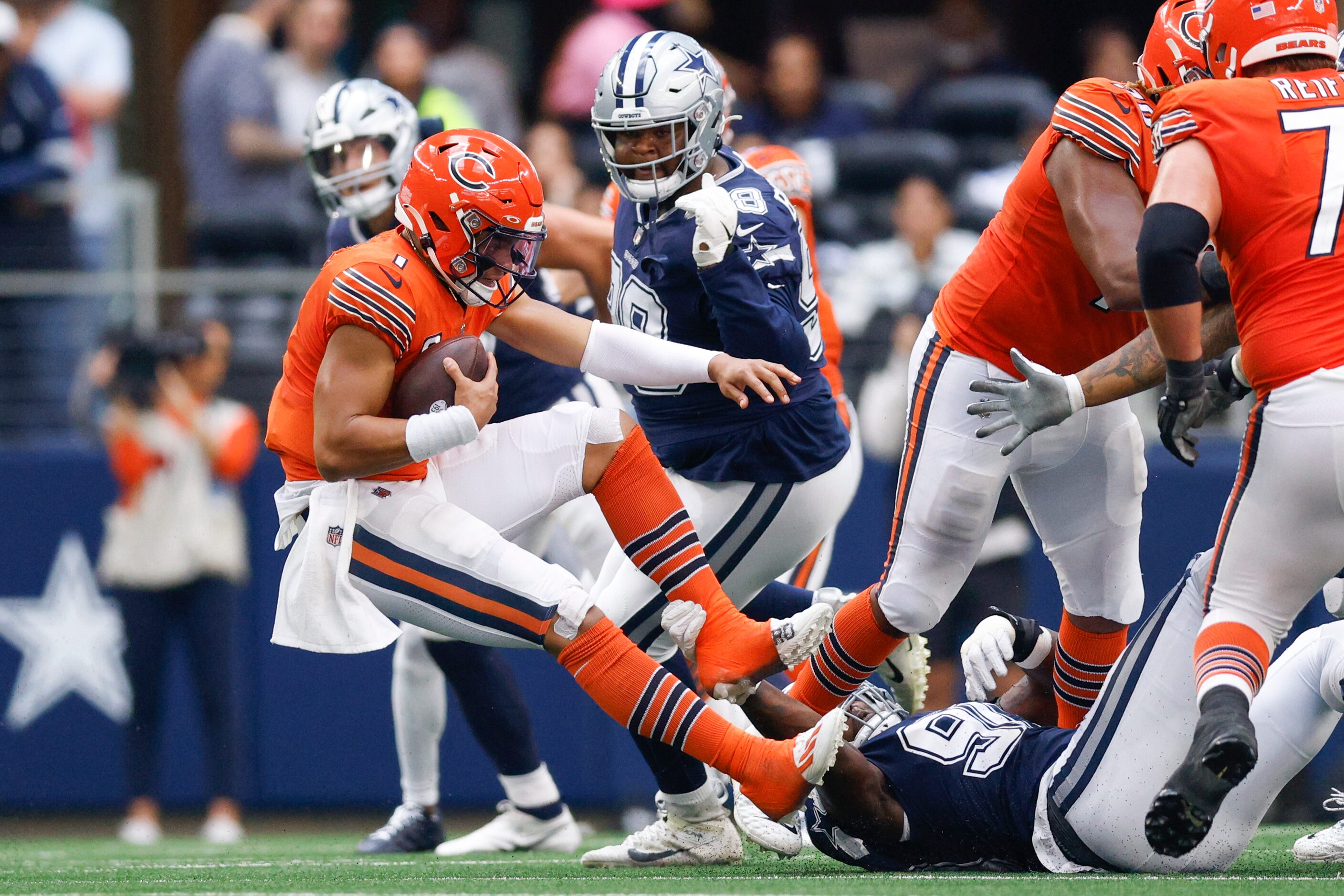 Dallas Cowboys defensive end DeMarcus Lawrence (90) sacks Chicago Bears quarterback Justin...