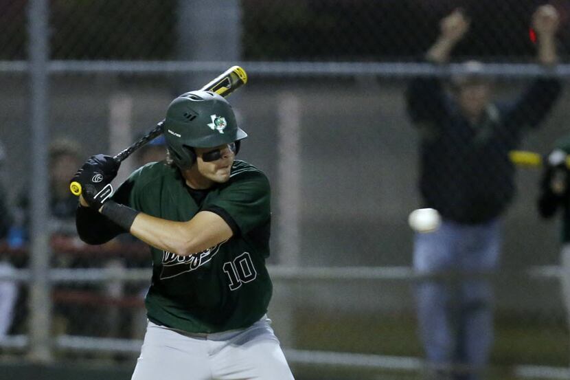 Southlake Carroll's Hudson Sanchez (10) takes a foul ball in the fourth inning of a high...