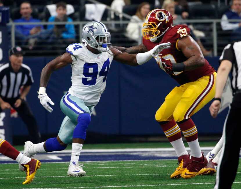 In this photo taken Jan. 3, 2016, Washington Redskins tackle Ty Nsekhe (79) blocks Dallas...
