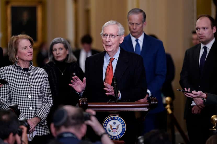 Senate Minority Leader Mitch McConnell, R-Ky., joined from left by Sen. Shelley Moore...