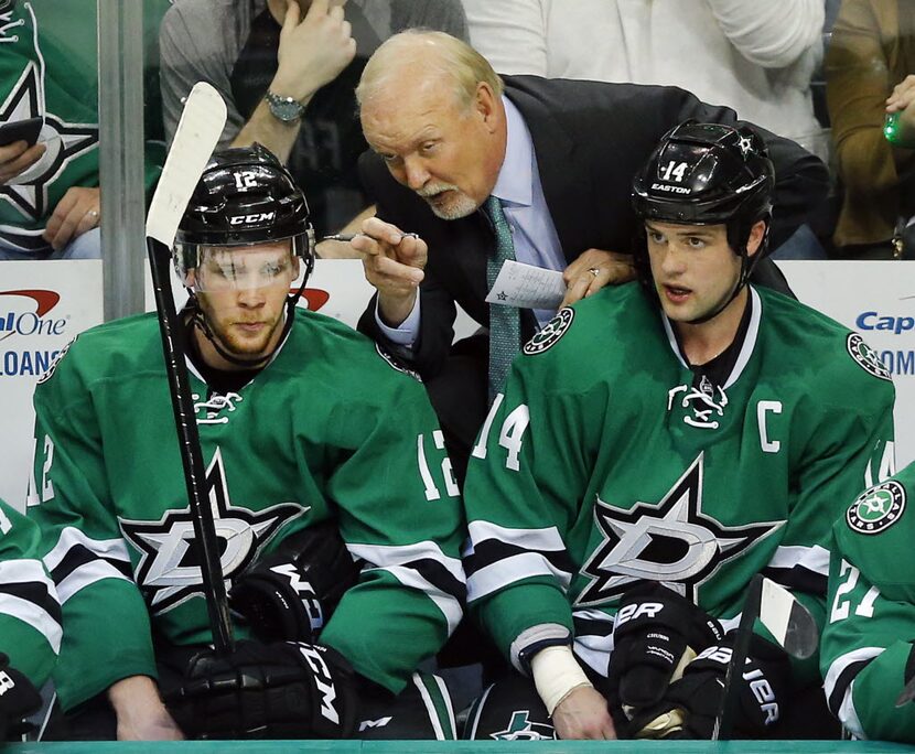 Dallas Stars head coach Lindy Ruff gives Dallas Stars center Radek Faksa (12) instruction on...