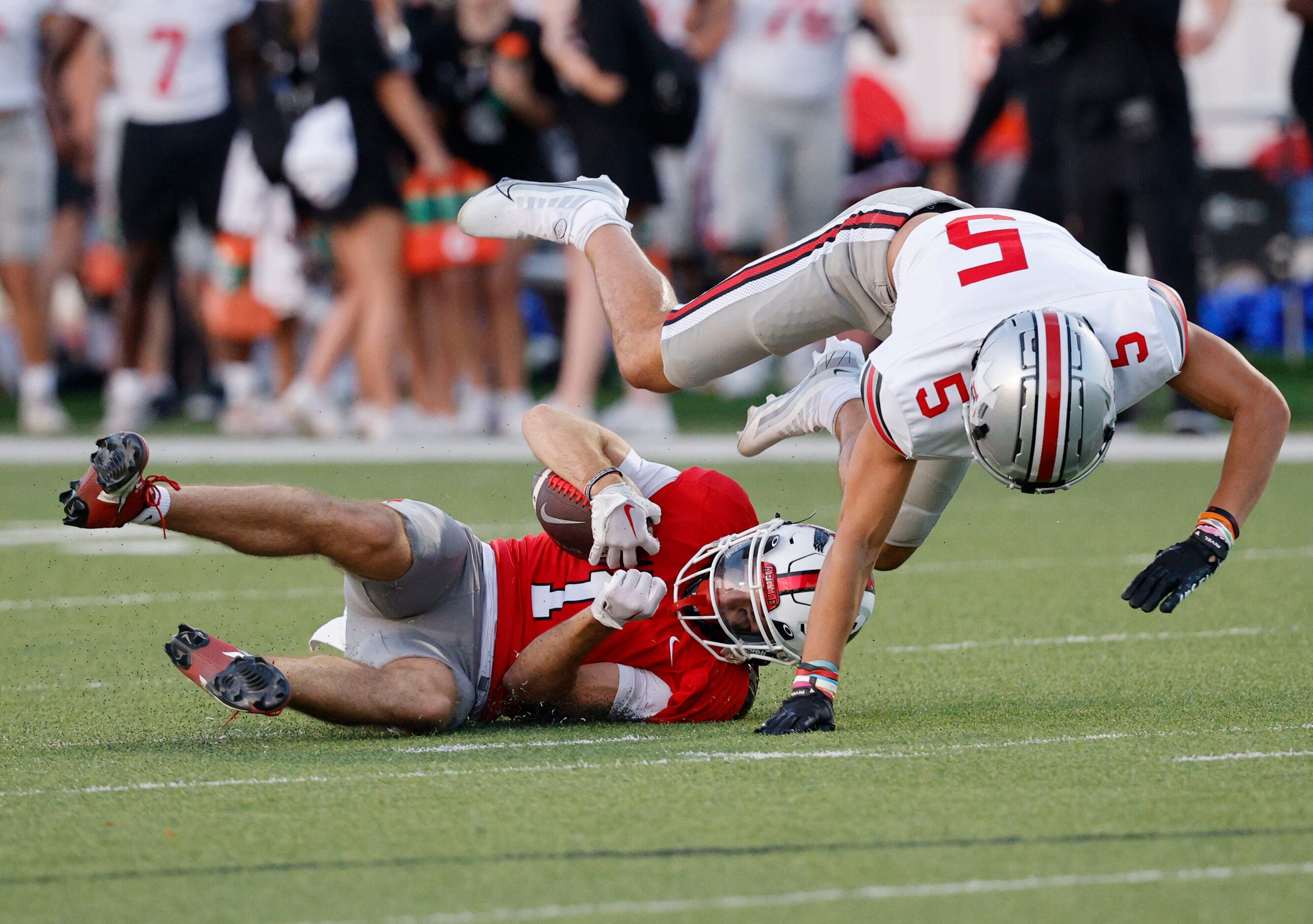 Lovejoy's Avery Fuller (5) tangles with Argyle's Will Krzysiak (1) during the first half of...