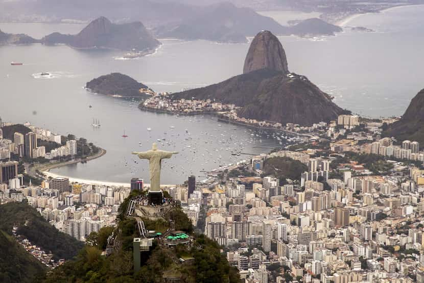 The Christ the Redeemer statue towers over Rio de Janeiro. Brazil borders all but two...