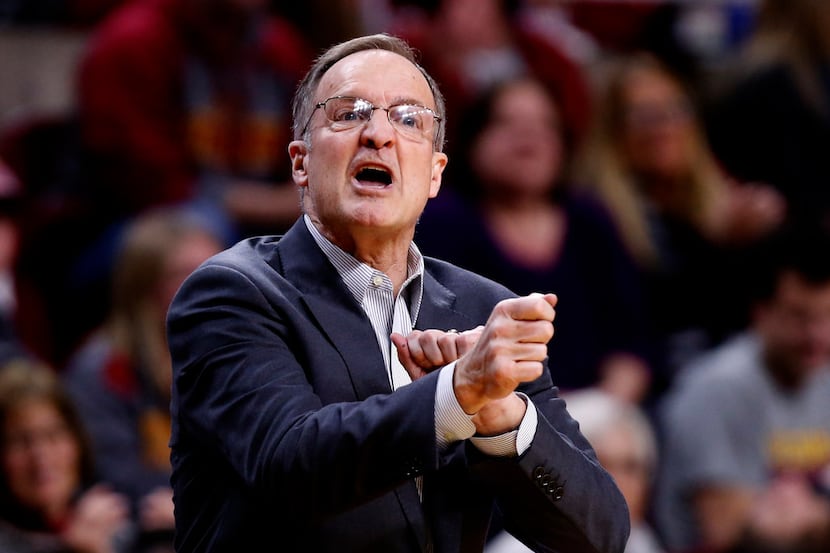 AMES, IA - FEBRUARY 25: Head coach Lon Kruger of the Oklahoma Sooners coaches from the bench...