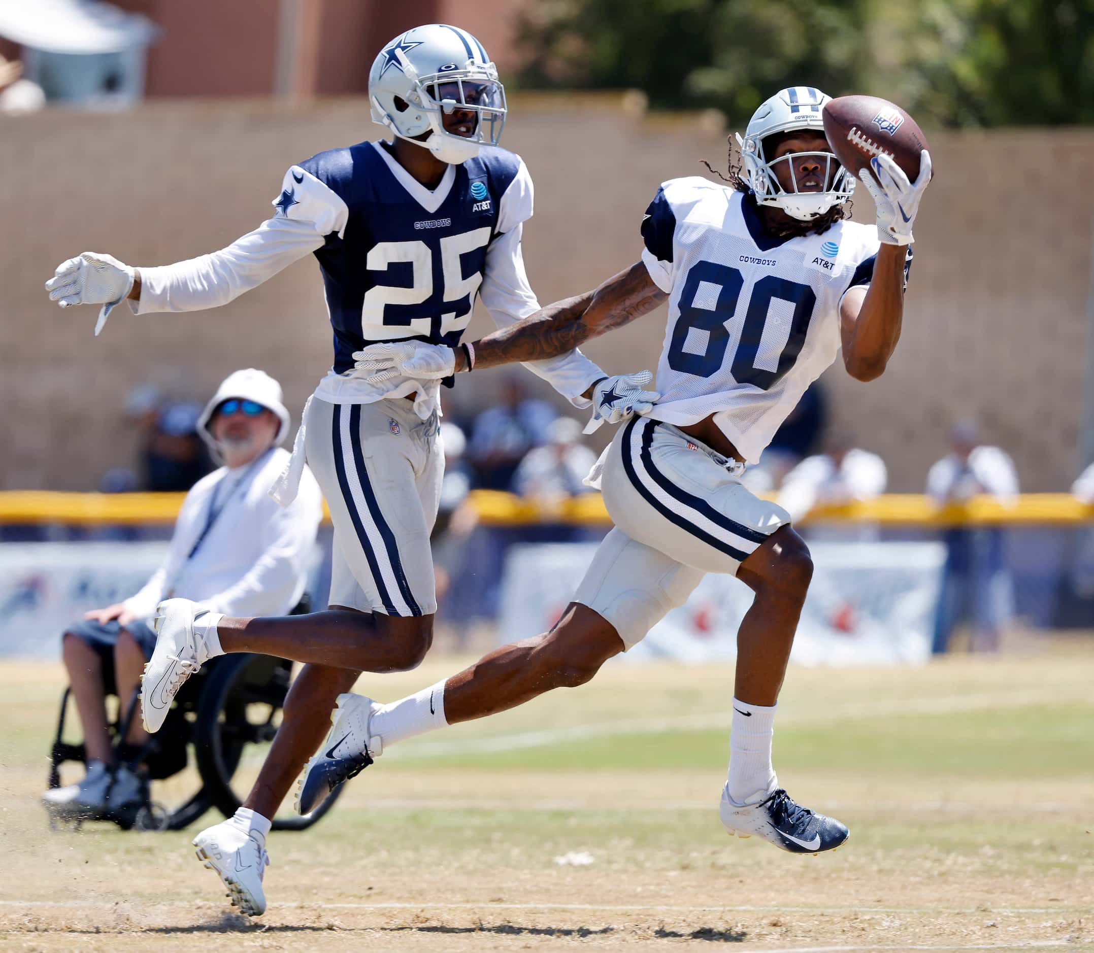 Dallas Cowboys wide receiver Brandon Smith (80) attempts a one-handed catch in the back of...