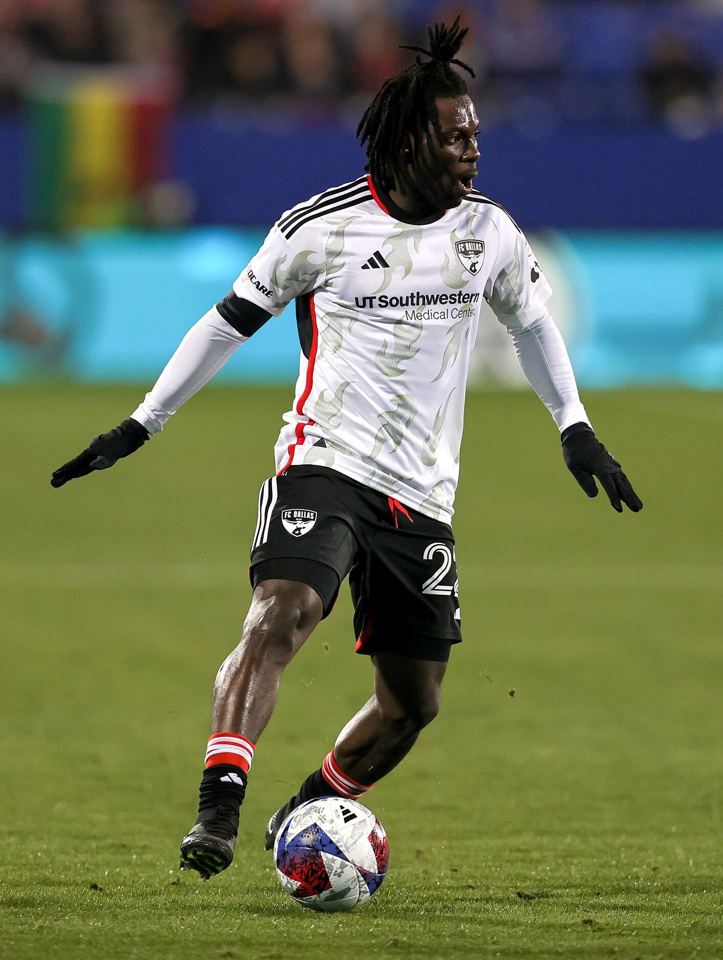 FC Dallas defender Ema Twumasi looks to pass against Minnesota United during the first half...