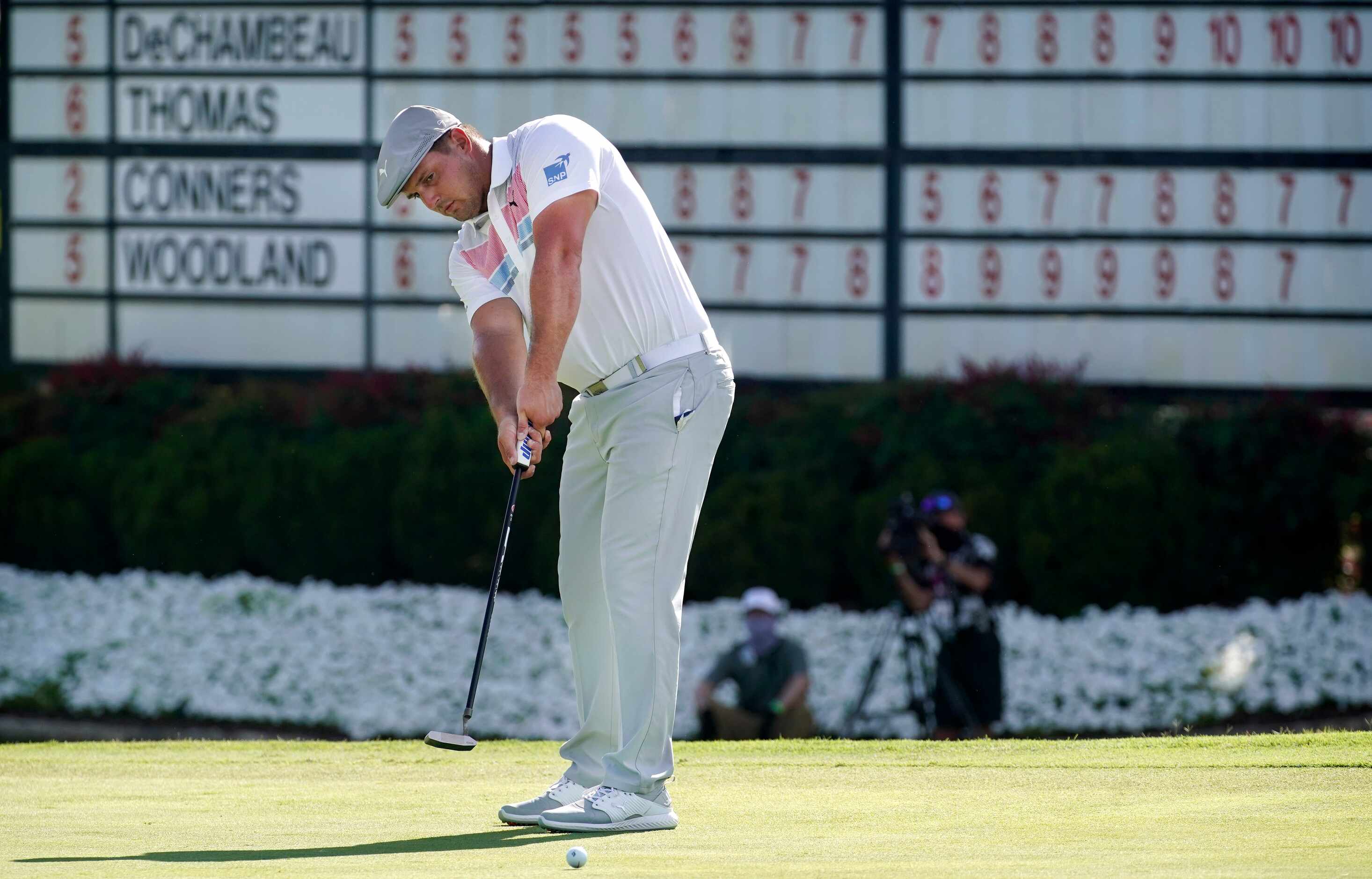 PGA Tour golfer Bryson DeChambeau attempts a birdie putt on No. 18 during the second round...
