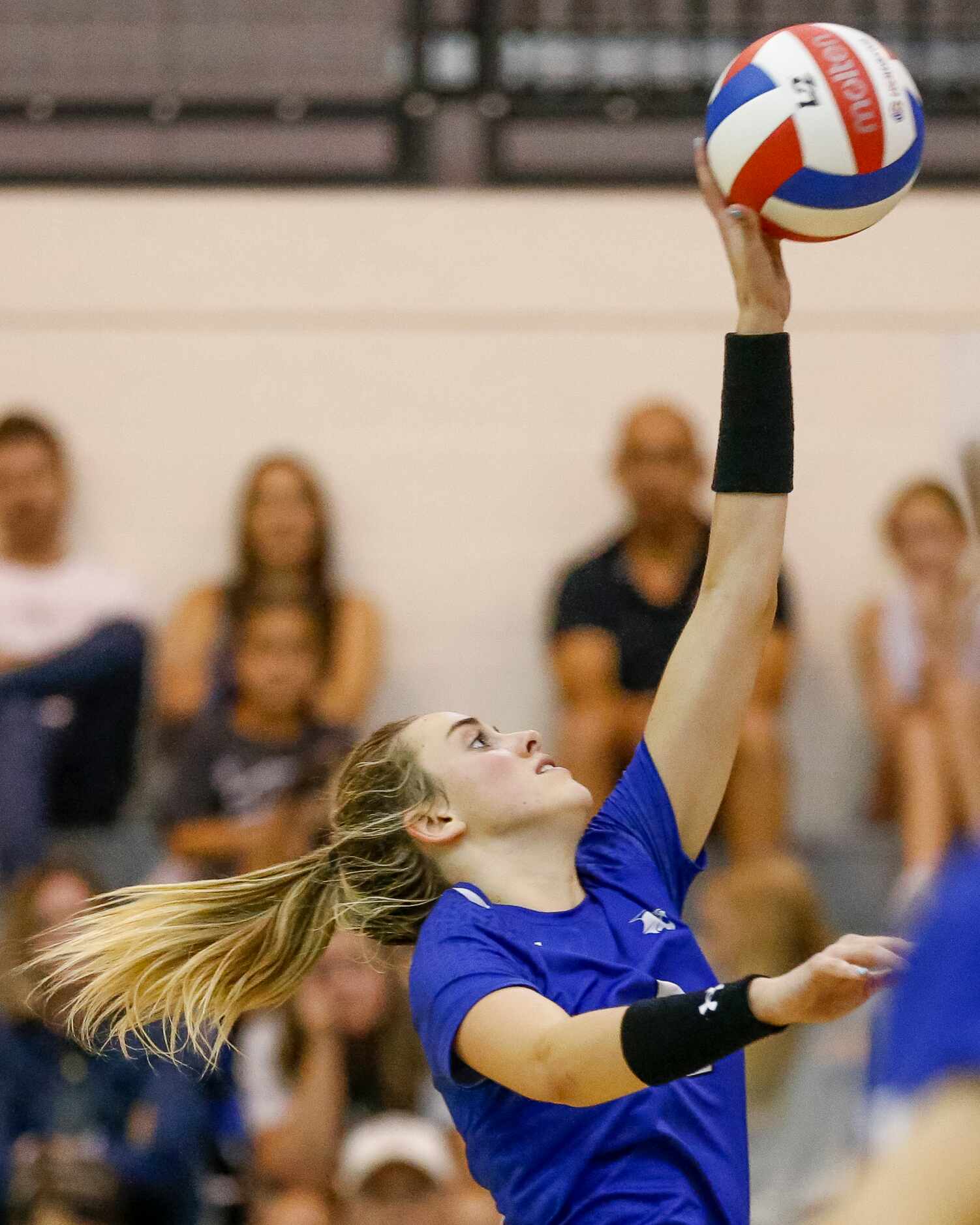 Trophy Club Byron Nelson outside hitter Sam Hoppes (9) hits the ball during the third fourth...
