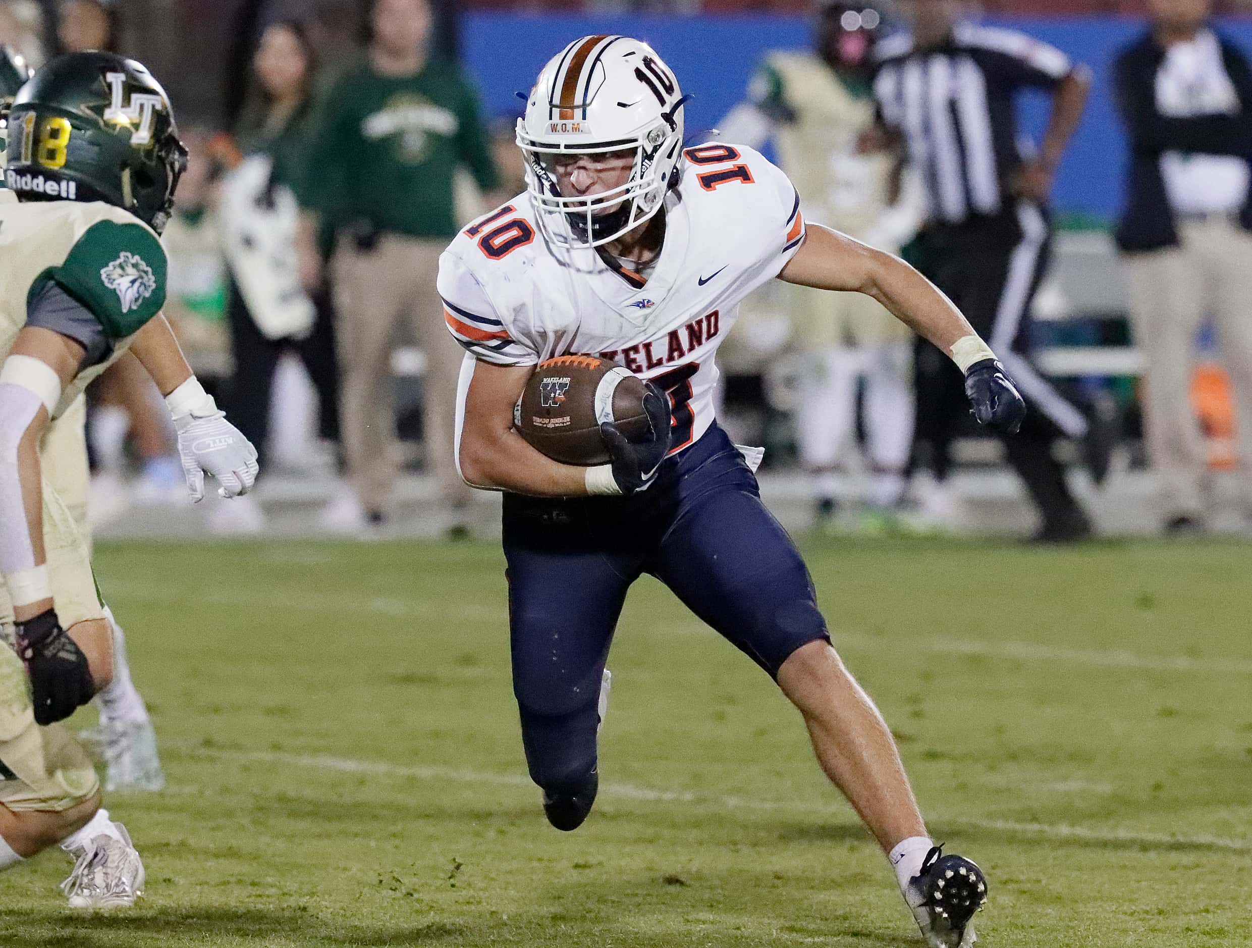 Wakeland High School wide receiver Grayson Myer (10) runs after a catch during the second...