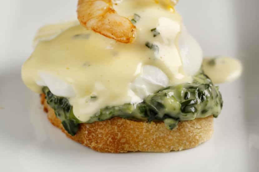 Call it jumbled shrimp Eggs Benedict. Starting at the botttom, layer a toasted baguette,...