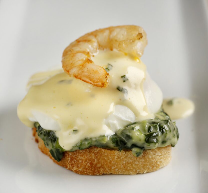 Call it jumbled shrimp Eggs Benedict. Starting at the botttom, layer a toasted baguette,...