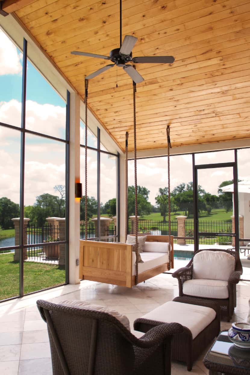 Relax on the screened-in porch. 