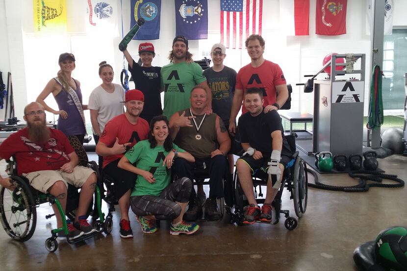  Frisco Insider Cindy Sampson (back far left) and her family visited the Adaptive Training...