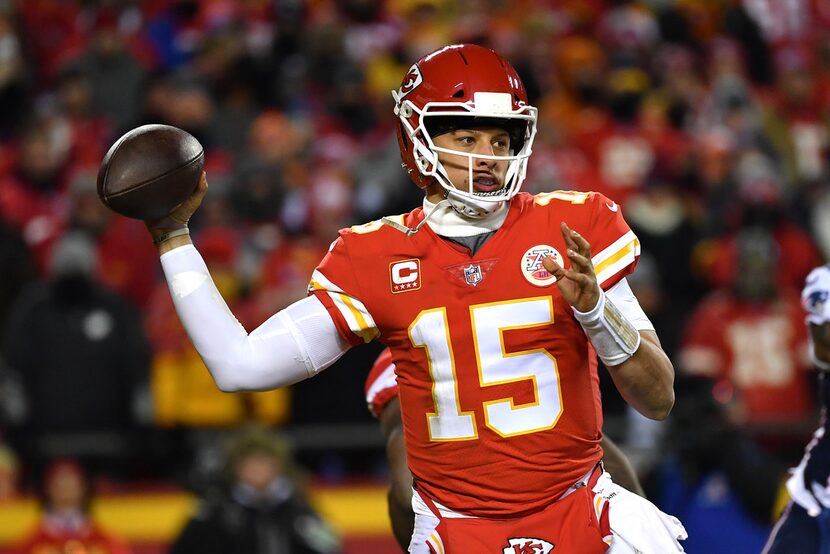 KANSAS CITY, MISSOURI - JANUARY 20: Patrick Mahomes #15 of the Kansas City Chiefs looks to...