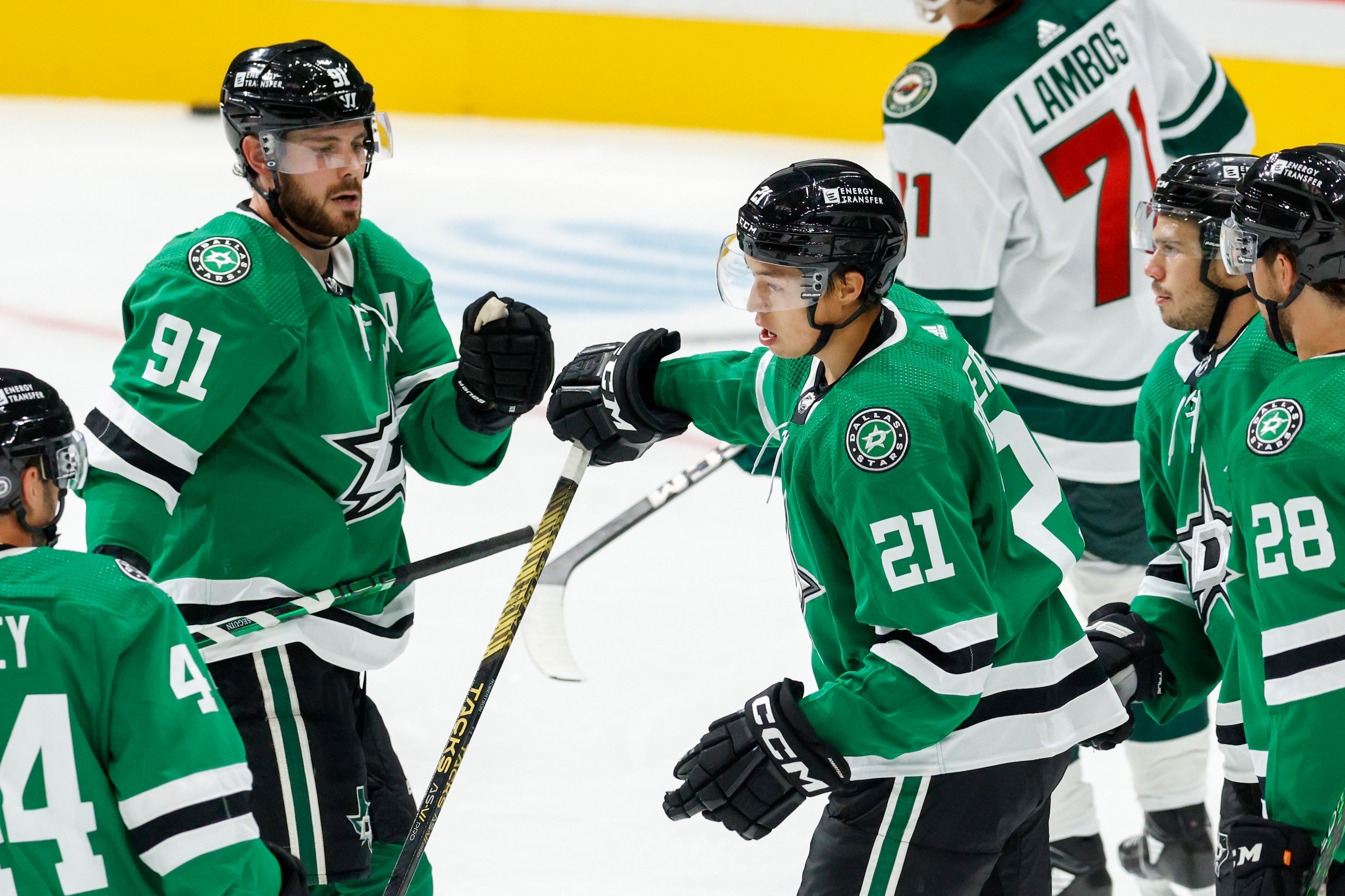 Dallas Stars left wing Jason Robertson (21) celebrates his goal with center Tyler Seguin...