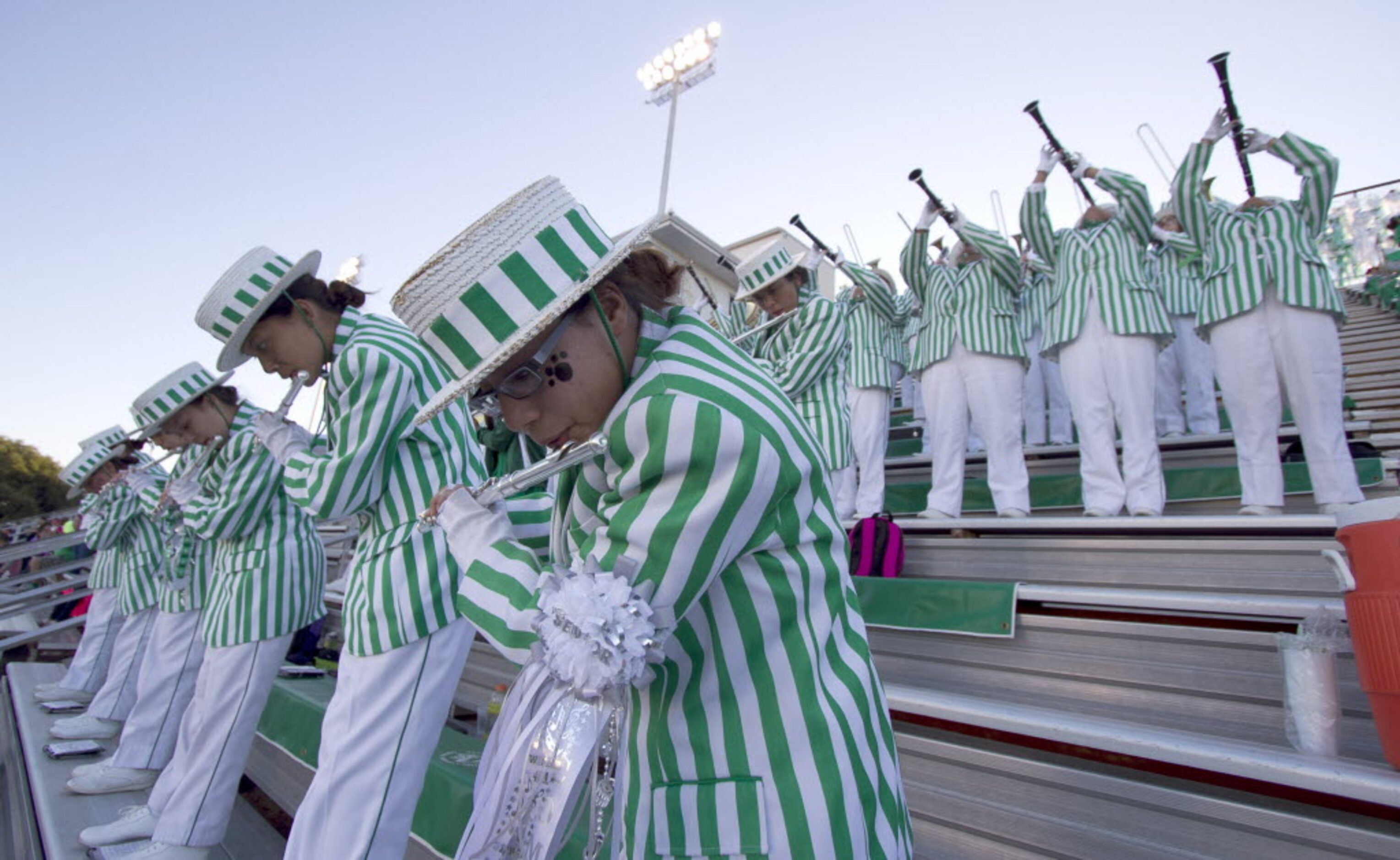 Members of the Bryan Adams band perform from the stands prior to the start of the Conrad...