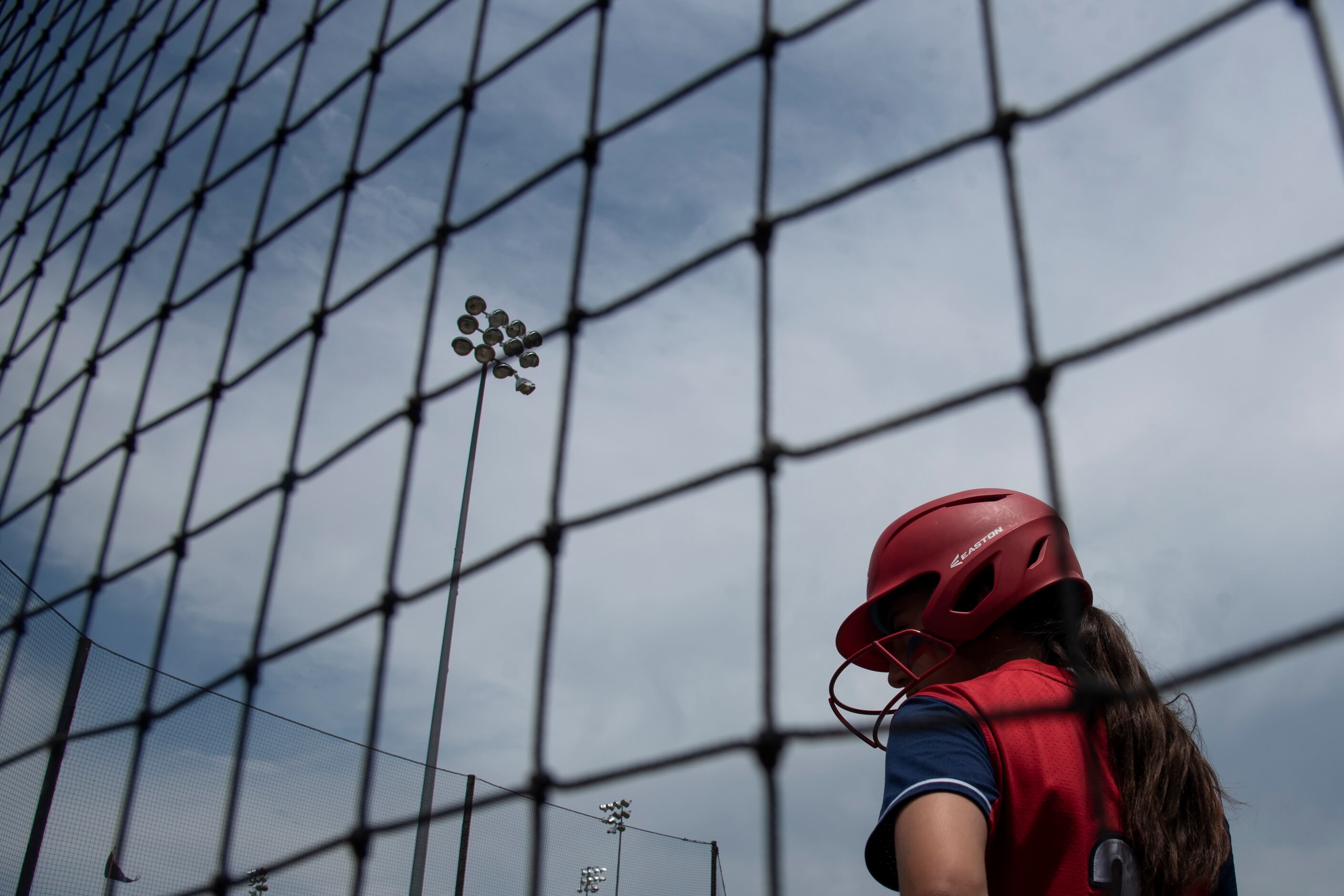 John Paul II freshman Keely Cuneo (2) waits for her turn to bat during the TAPPS Softball...