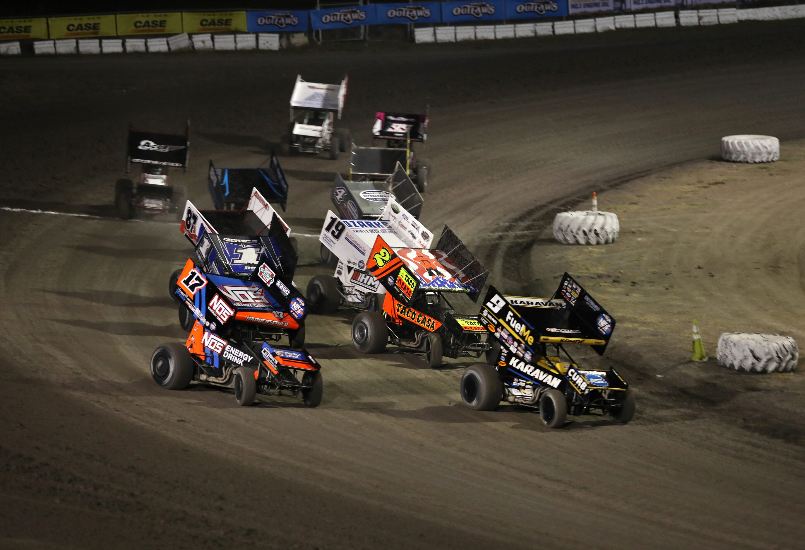 Dirt track racing creates a unique fan experience, with mud flying into the surrounding...