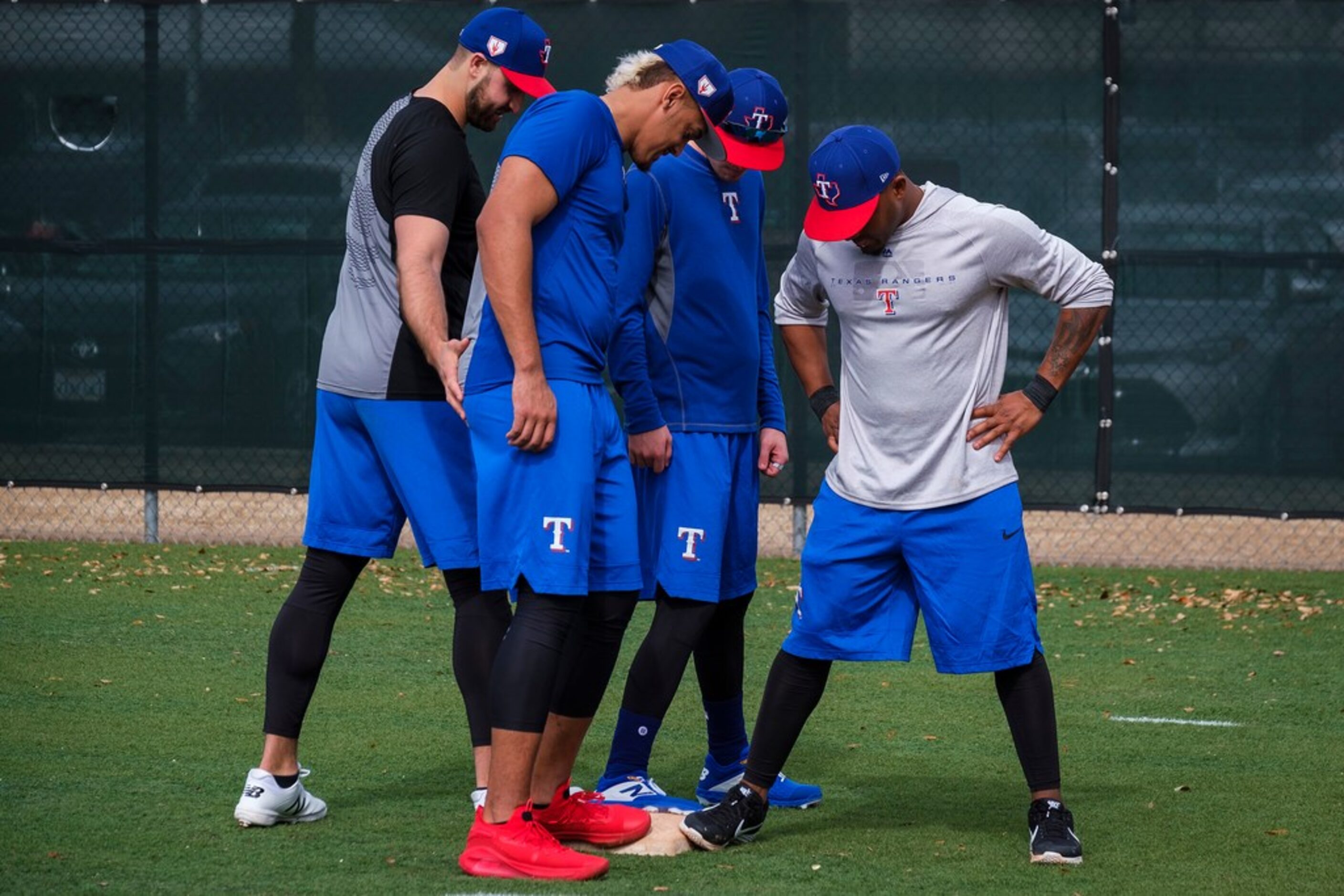 Texas Rangers outfielder Joey Gallo (from left), infielder Ronald Guzman, outfielder Carlos...