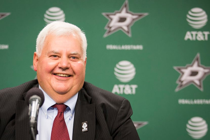 Ken Hitchcock smiles is introduced as the Dallas Stars new coach during a press conference...
