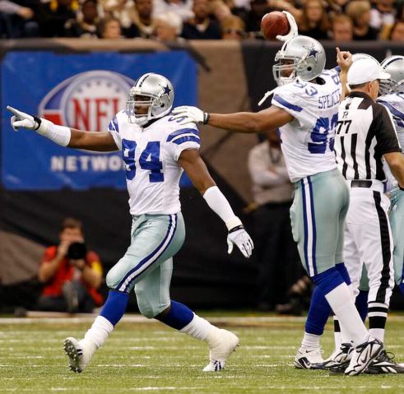 FILE - DeMarcus Ware (94) celebrates a forced fumble.