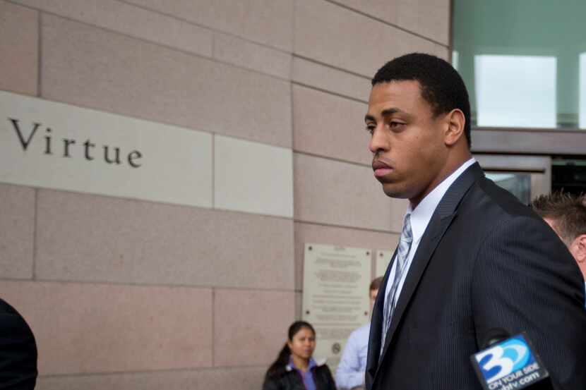 Greg Hardy, then with the Carolina Panthers, left the Mecklenburg County Courthouse after...