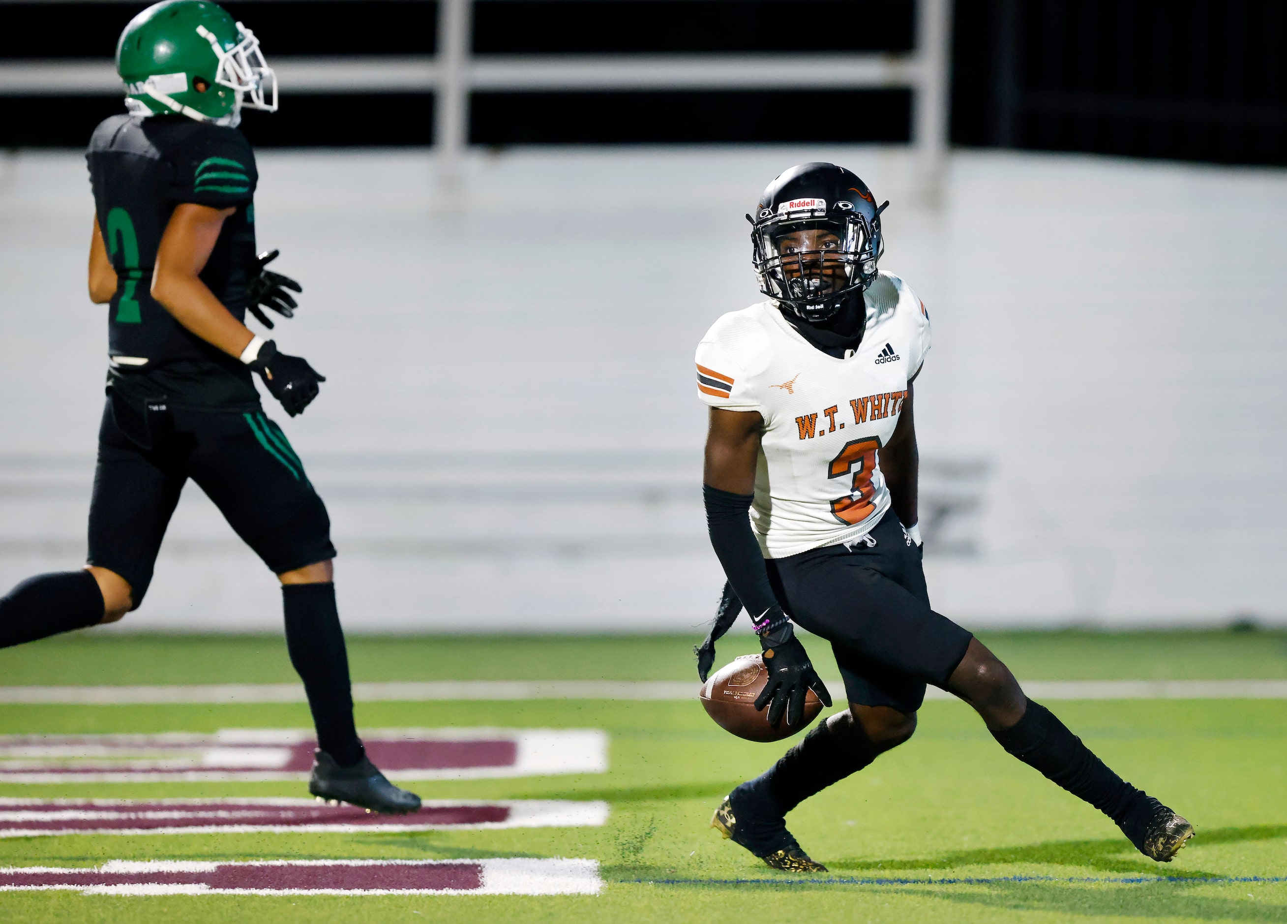 W.T. White wide receiver Ricky Bristo (3) scores a second quarter touchdown ahead of Bryan...