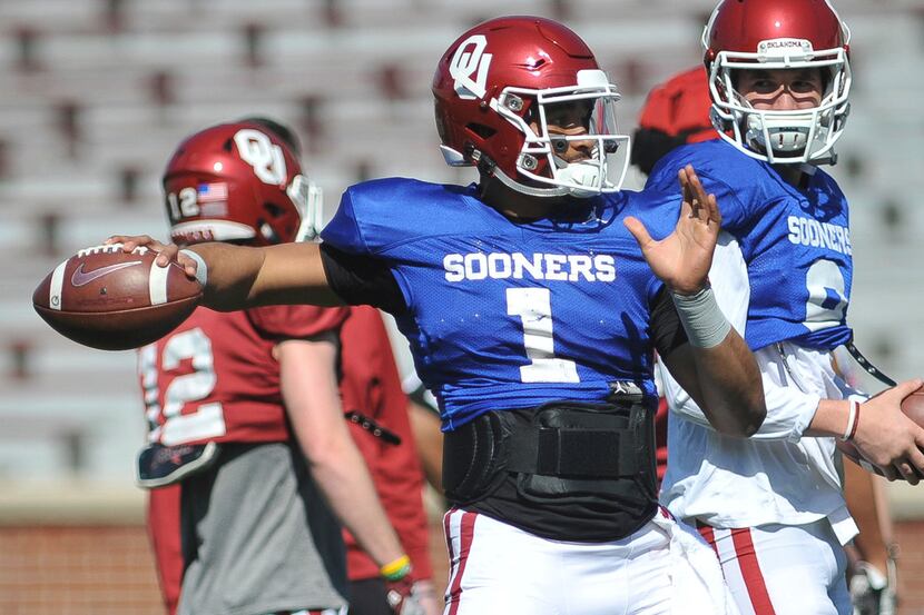 Oklahoma quarterback Jalen Hurts throws during practice in norman, Okla., Monday, April 1,...