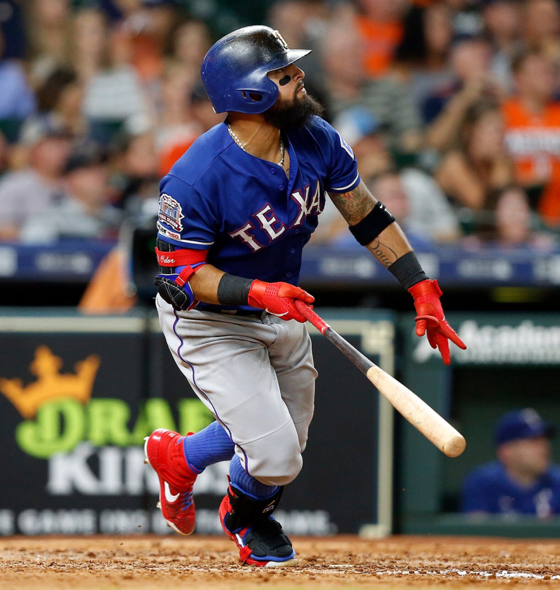 HOUSTON, TEXAS - JULY 19: Rougned Odor #12 of the Texas Rangers hits a home run in the sixth...