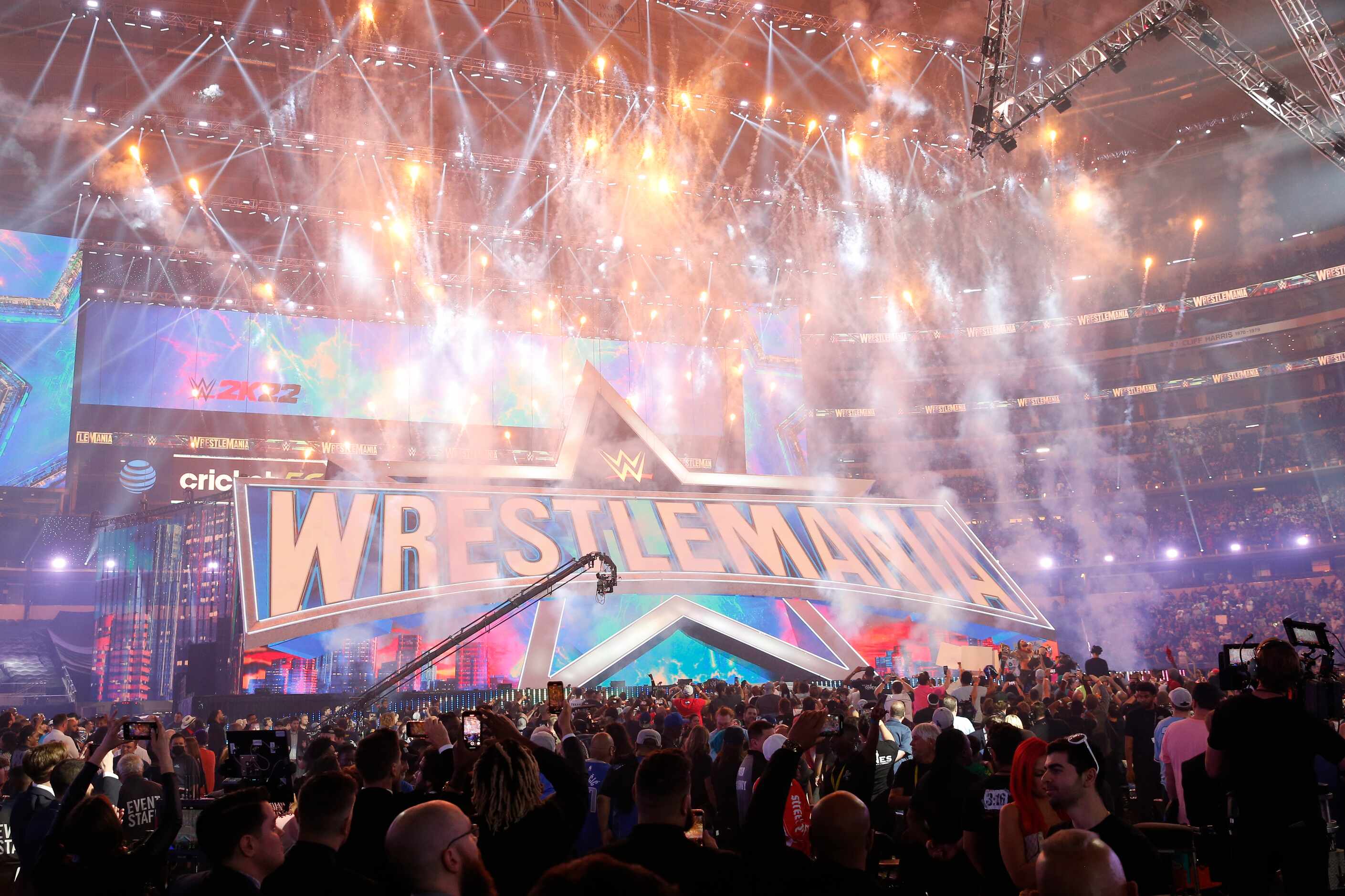 Fireworks erupt over the stage after WrestleMania Sunday at AT&T Stadium in Arlington,...