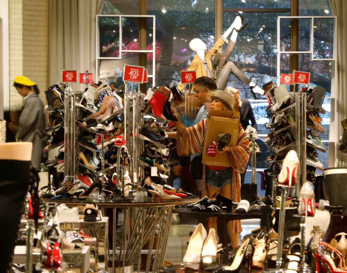 Teecy Mai shops for shoes at Neiman Marcus in NorthPark Center in Dallas. 